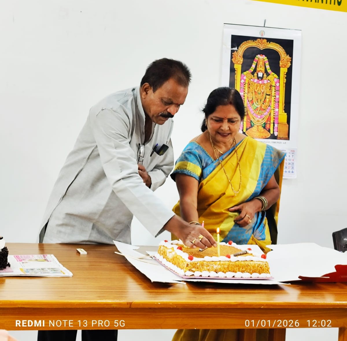13 Dr S Manohar Rao Garu and Radhika Garu cutting Newyear cake.jpeg